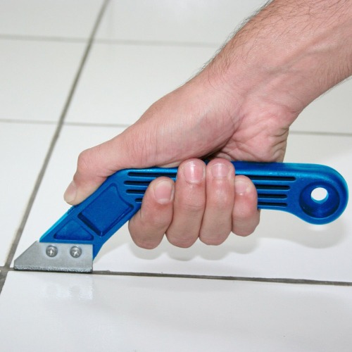 Raspador de rejunte com duas lminas